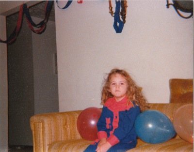 Young Shannon is not impressed, but she did dress to match her decorations.