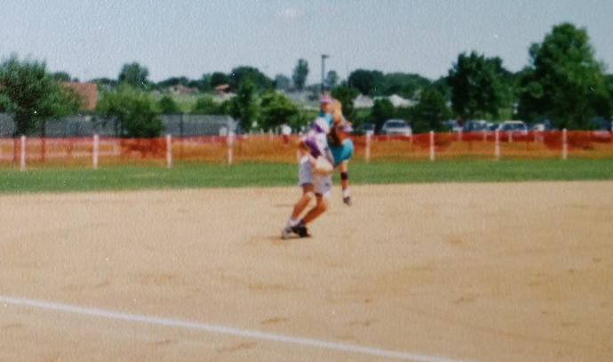 Those blurs are Heidi at shortstop and me at third. If memory serves, we called ourselves The Wall, because nothing got through our side of the infield.
